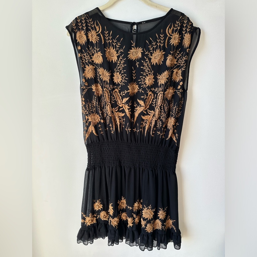 Free People sheer dress/can also be worn as a top.